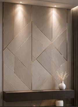 ٣٠ تصميم تكسيات جدارية — ألواح رخام هندسية: تشكيل هندسي من الرخام الأبيض بخطوط منكسرة أنيقة.